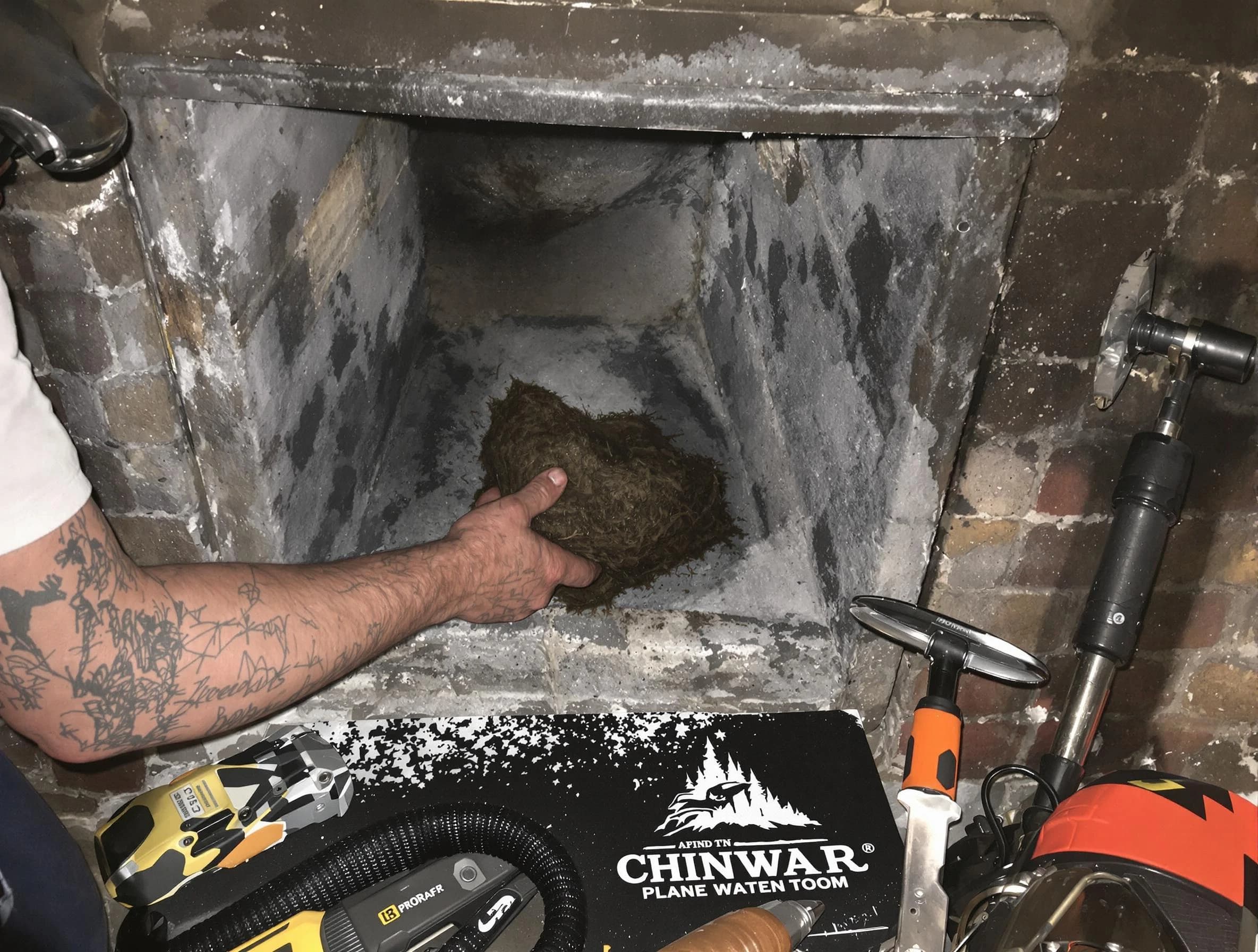 Butler Chimney Sweep safely removing debris and screening chimney in Butler, PA