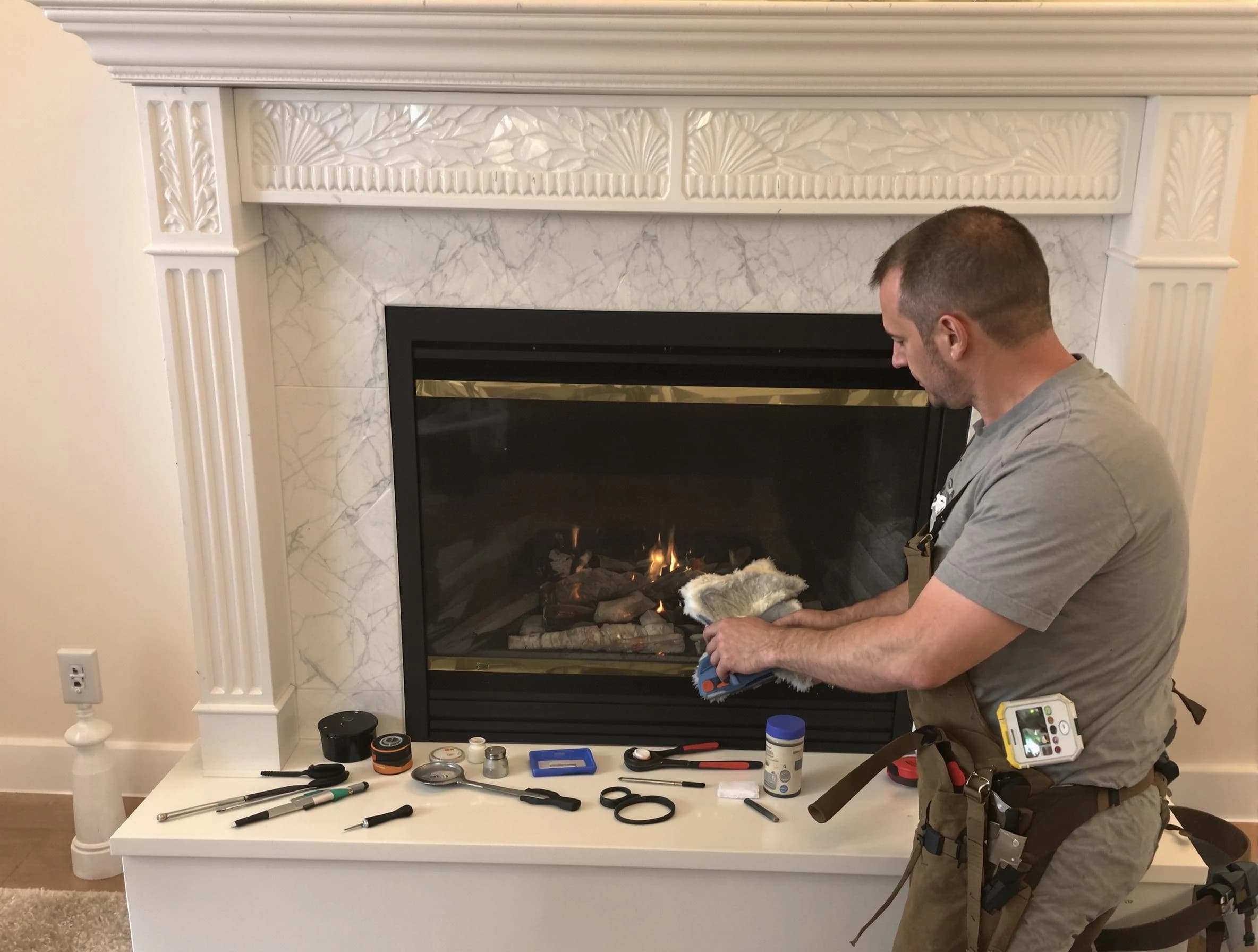 Butler Chimney Sweep performing fireplace maintenance in Butler, PA